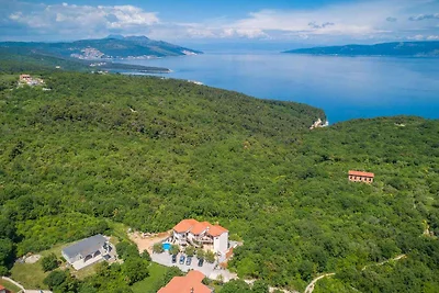 Ferienwohnung mit Meerblick und Pool