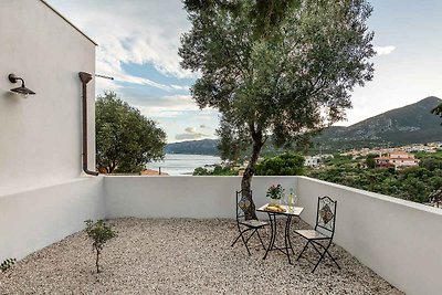 Ferienhaus mit Waschmaschine, Balkon und