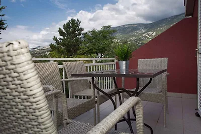 Ferienwohnung mit Poolnutzung und Meerblick