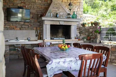 Ferienhaus mit Pool und Meerblick