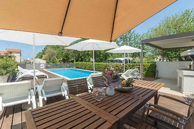 Ferienwohnung mit Pool und Meerblick