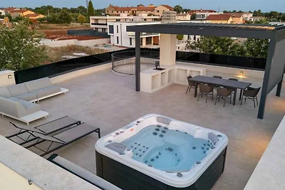 Villa mit Whirlpool und Sauna