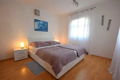 Ferienwohnung mit Klimaanlage und Parkplatz