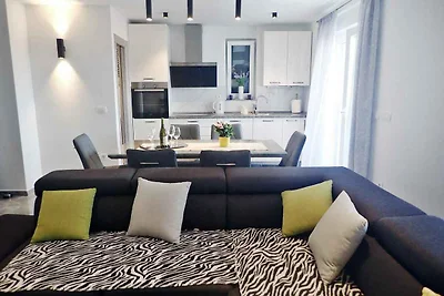 Ferienhaus mit Pool und Meerblick