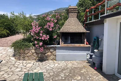 Ferienwohnung mit Poolnutzung und Meerblick