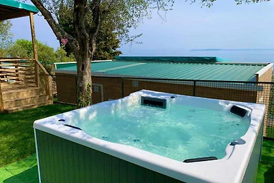 Mobilehome mit Terrasse mit Seeblick, Pool un