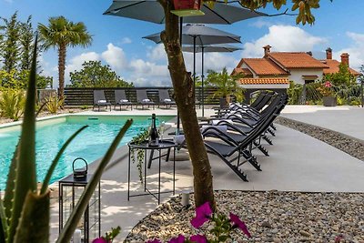 Ferienwohnung mit Pool und Meerblick