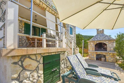 Ferienhaus mit Balkon, Grillmöglichkeit und