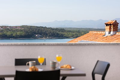 Ferienwohnung mit einen Balkon und Meerblick