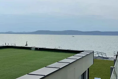 Ferienwohnung mit eigenem Strand, WLAN und