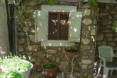 Studio mit TV und Terrasse