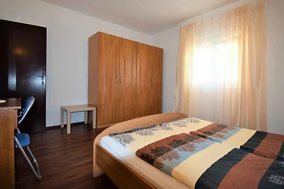 Ferienwohnung mit Balkon, Garten und Grill