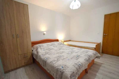 Ferienwohnung mit Terrasse und Parkplatz
