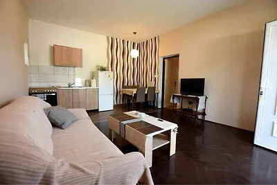 Ferienwohnung mit möbiliertem Balkon