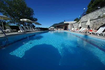 Ferienwohnung mit Seeblick und Pool