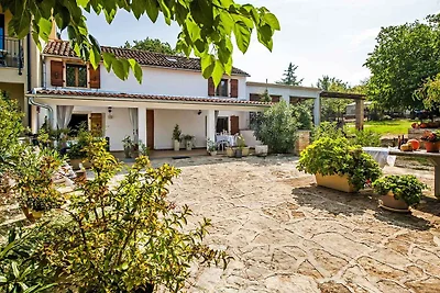 Ferienhaus mit privatem Garten und Grill für 