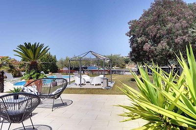 Ferienhaus mit Pool und Grill, am Meer