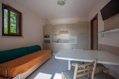 Bungalow mit Terrasse und Klimaanlage