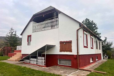 Ferienhaus mit Schaukel und Gartendusche