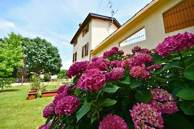 Ferienhaus mit Garten und Klimaanlage