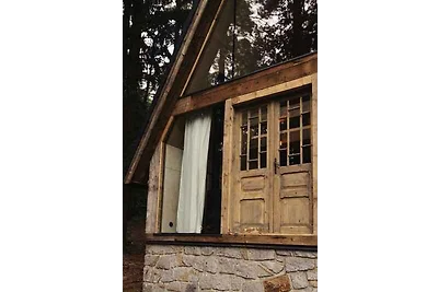 Hütte mit Kamin und beheiztem Aussenfass