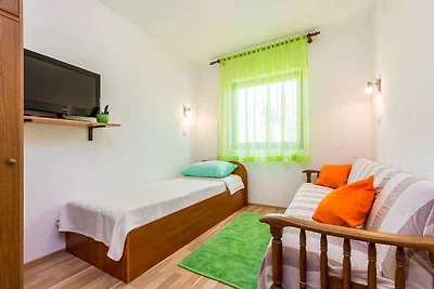 Ferienhaus mit Klimaanlage und Garten