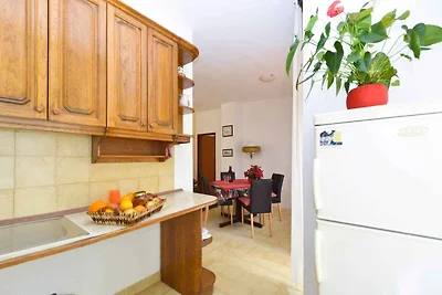 Ferienwohnung mit Balkon mit Gartenmöbeln