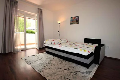 Ferienwohnung mit Balkon, Garten und Grill