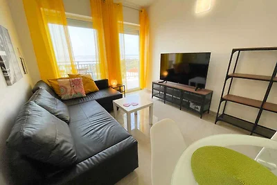 Ferienwohnung mit Balkon und Meerblick
