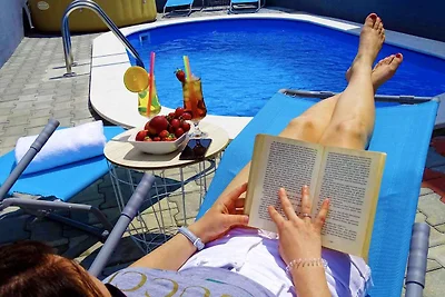 Ferienwohnung mit Pool- und Meerblick