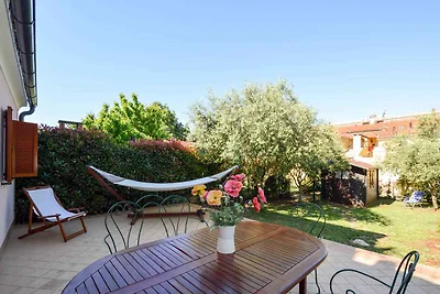 Ferienwohnung mit Garten und Klimaanlage