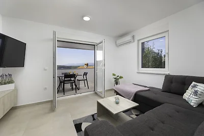 Ferienwohnung mit einen Balkon und Meerblick