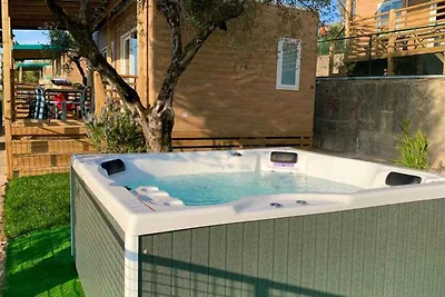 Mobilehome mit Terrasse mit Seeblick, Pool un