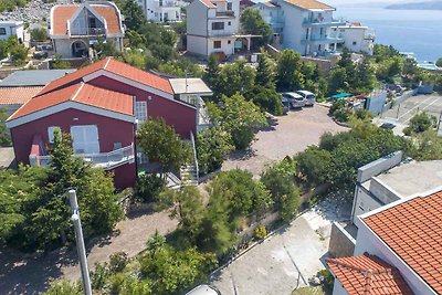 Ferienwohnung mit Poolnutzung und Meerblick