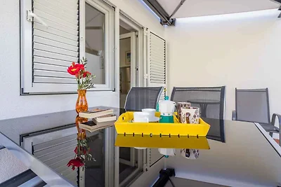 Ferienwohnung mit Garten und Klimaanlage