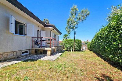 Ferienhaus mit Blick auf den Garten