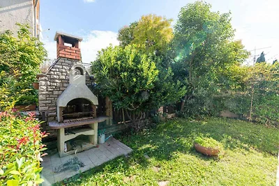 Ferienwohnung mit Terrasse und Garten