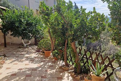 Ferienhaus mit Garten und Klimaanlage