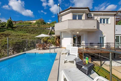 Ferienhaus mit Terrasse und Pool