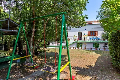 Ferienhaus mit Garten, Grill und