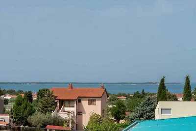 Ferienwohnung mit Aussenpool und Meerblick