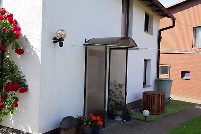Ferienhaus mit Kinderschaukel und