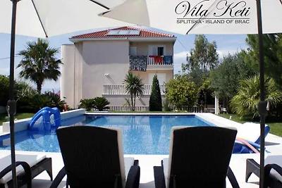 Ferienwohnung mit Blick auf den Pool und den