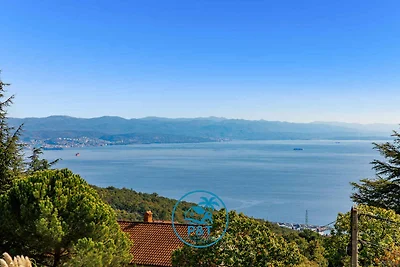 Ferienhaus mit Pool und Meerblick