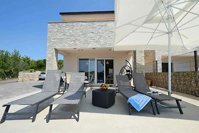 Ferienhaus mit einem Pool und drei