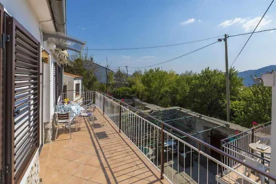 Ferienhaus mit Balkon und Klimaanlage