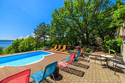 Ferienwohnung mit Pool und Meerblick