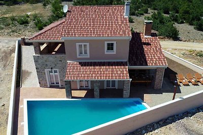 Ferienhaus mit Meerblick und Pool