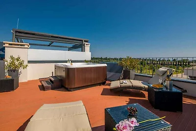 Ferienhaus mit Dachterrasse und Jacuzzi mit S
