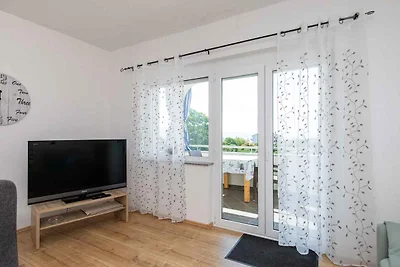 Ferienwohnung mit Balkon und Blick aufs Meer